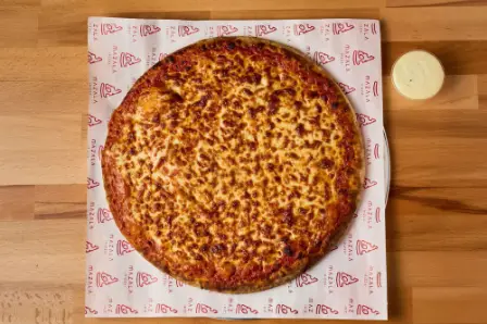 Mazala cheese pizza on branded Mazala paper