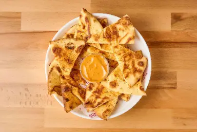 Naan bites with spiced dip